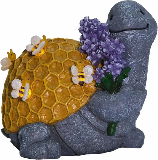 bee turtle garden statue with honeycomb pattern and purple flowers