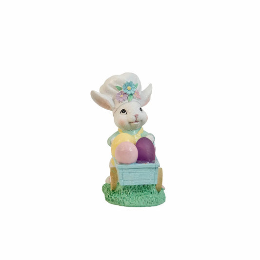 Zayton Easter bunny figurine pushing mint-green egg cart with pastel Easter eggs — hand-painted glitter resin spring decoration on white background