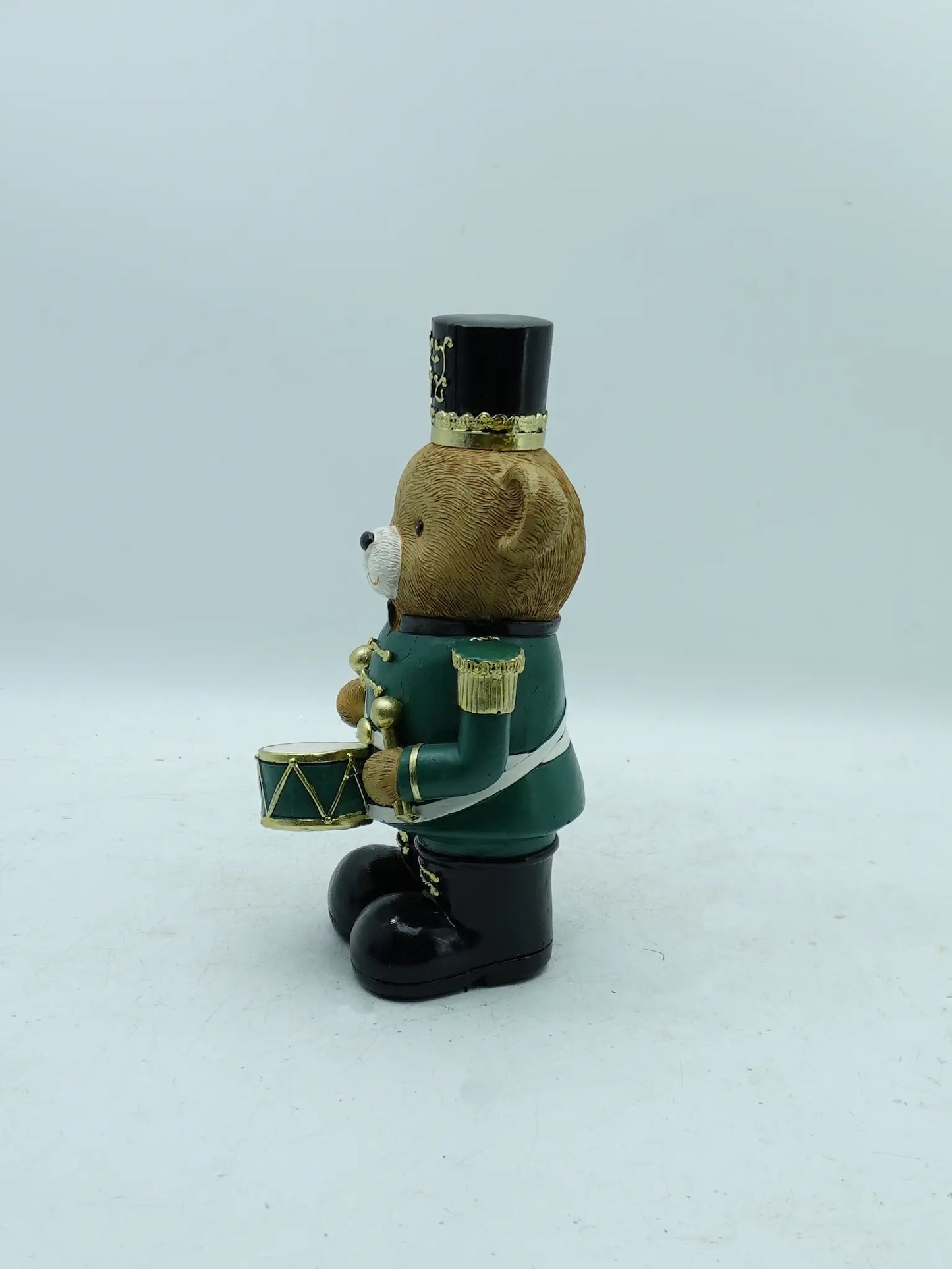 the green uniform teddy bear drummer figurine, side view
