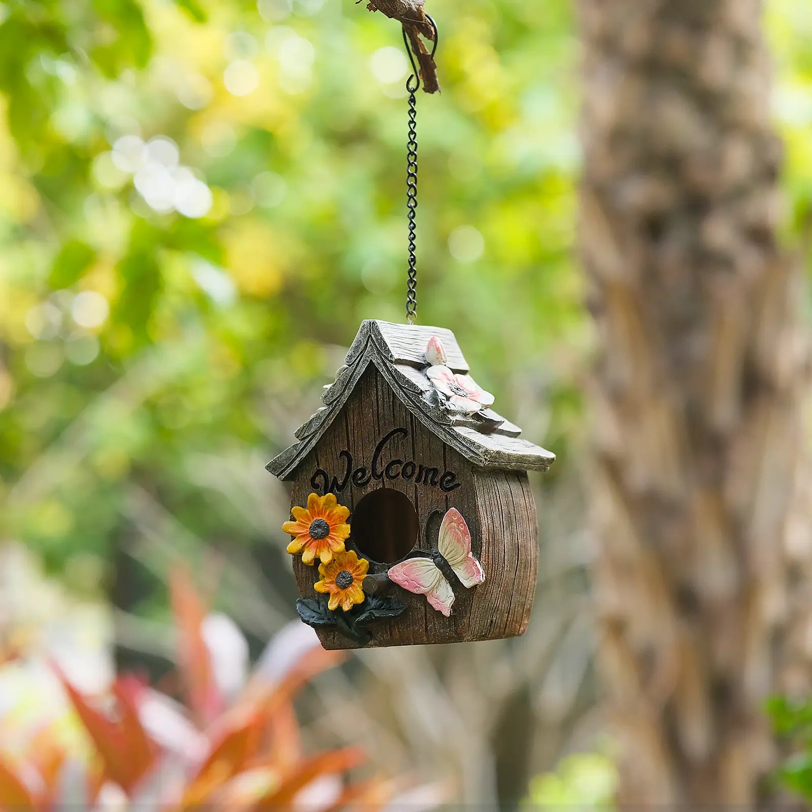 Welcome birdhouse with sunflower and butterfly hanging on chain