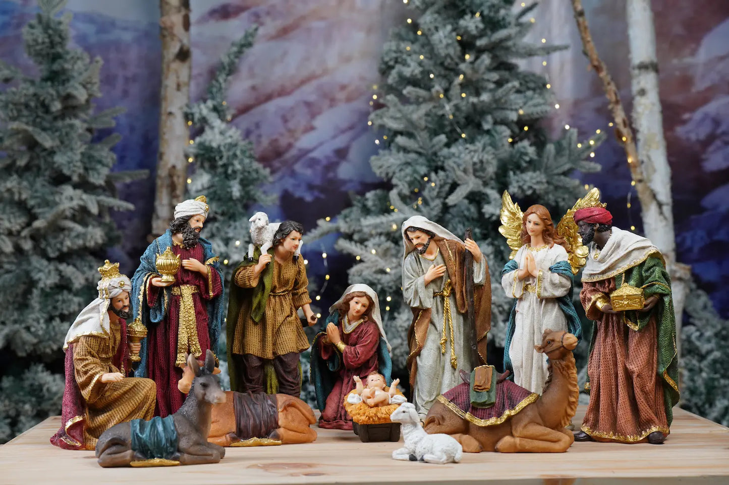 Colorful nativity scene set displayed indoors as Christmas tabletop decor, Bethlehem crèche style