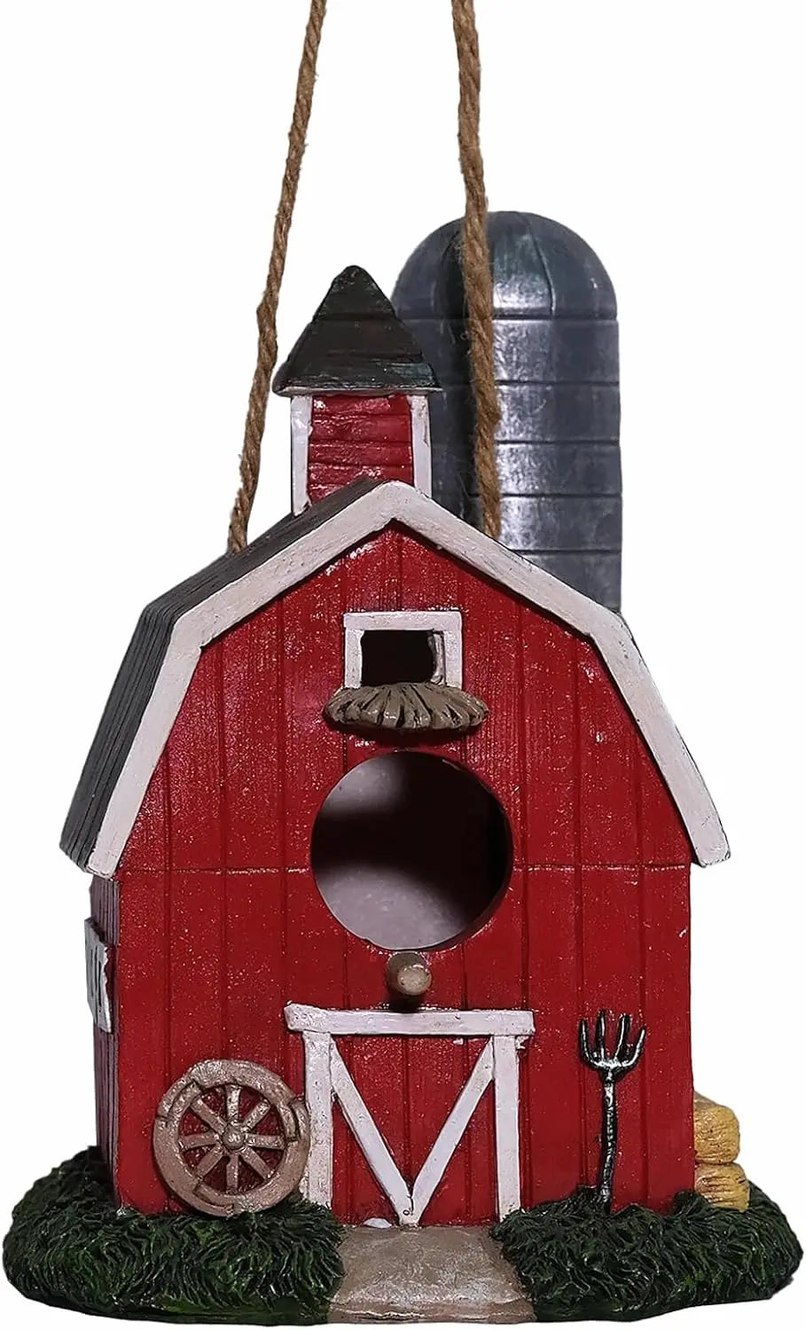 Resin red barn birdhouse with wagon wheel, pitchfork, and hay bales