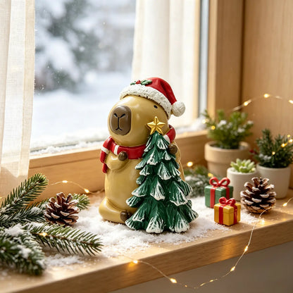 the capybara with mini tree figurine displayed on a snowy windowsill with pine cones and fairy lights
