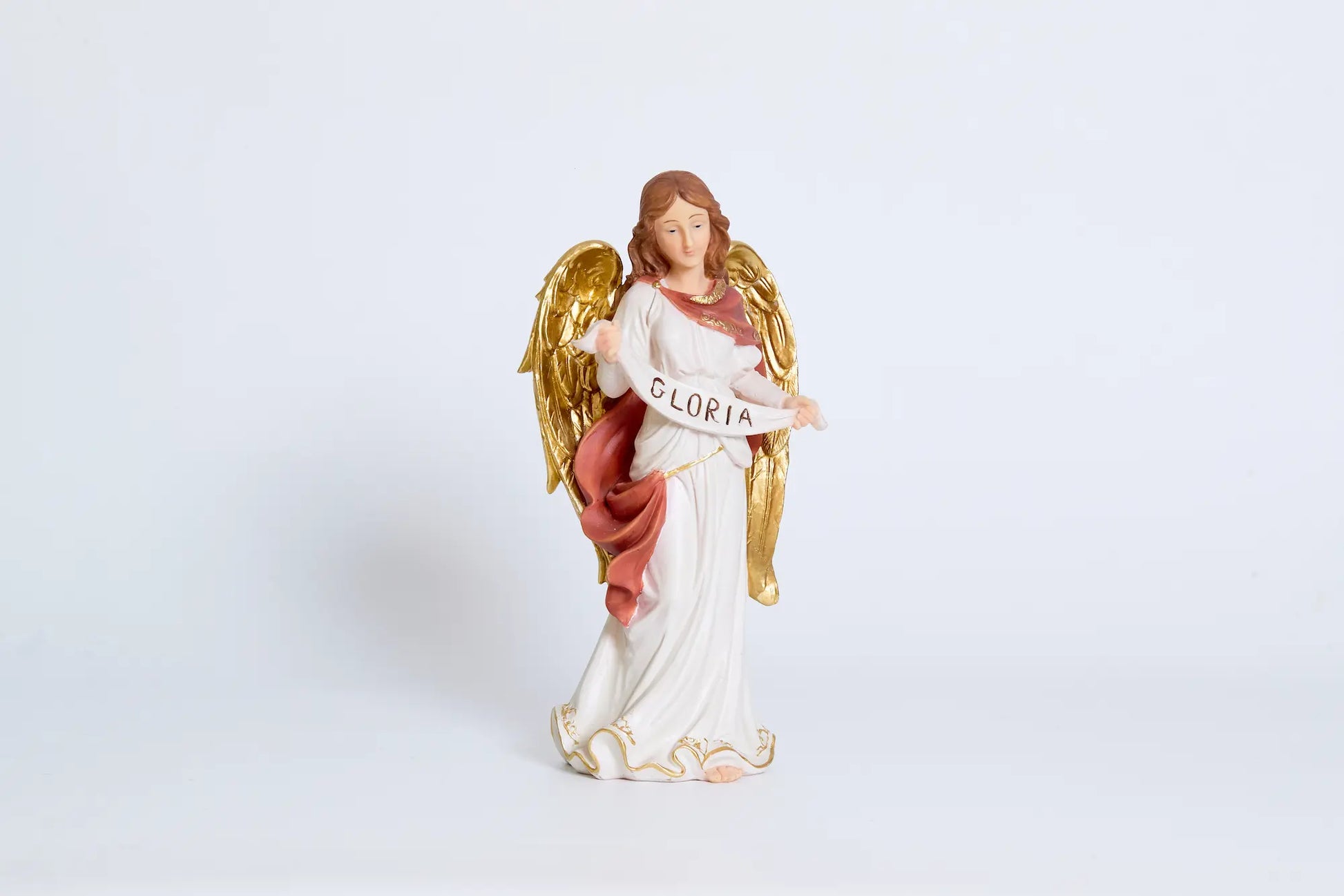 GLORIA angel figurine close-up with gold wings, Christmas angel nativity decor.
