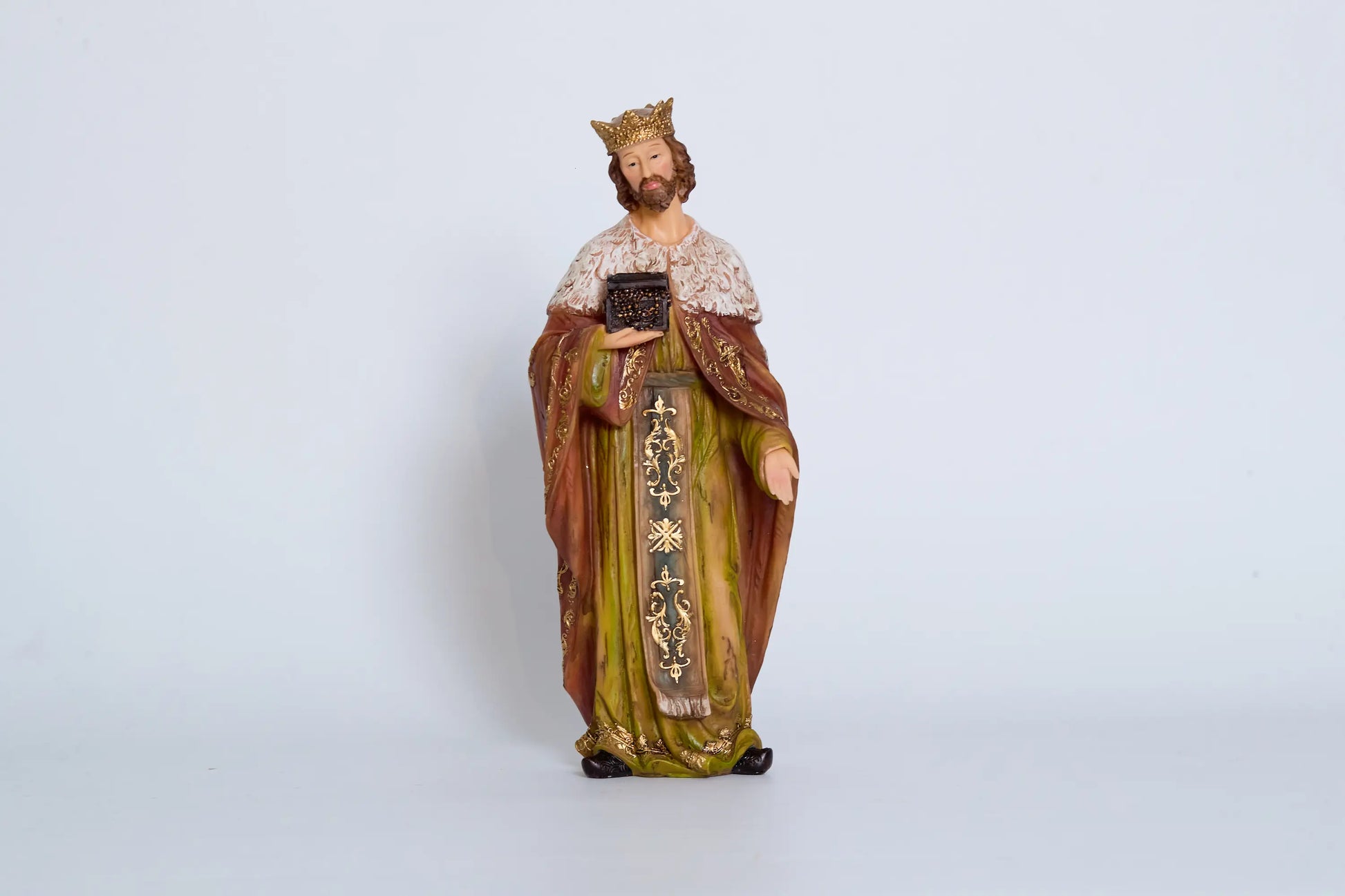 King Melchior Statue – Ornate figurine of the Wise Man holding a treasure chest, wearing crown and royal robes, religious nativity decor