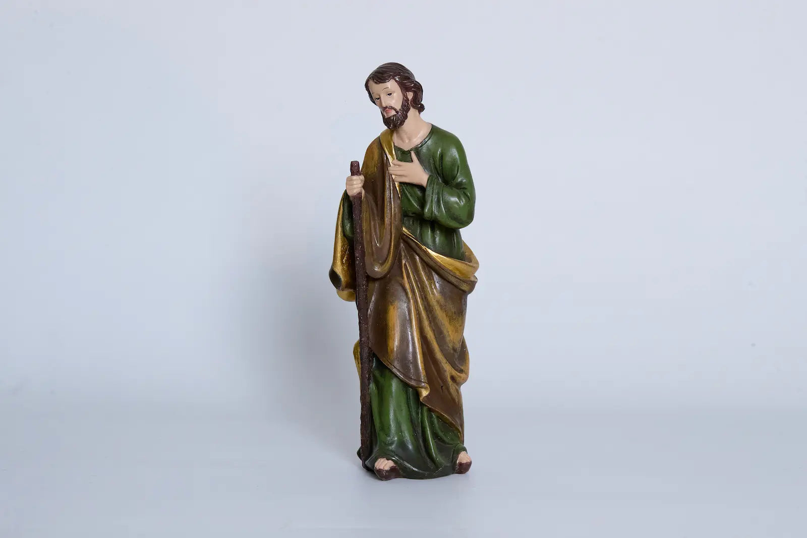 Nativity Saint Joseph close-up — hand-painted resin figurine with staff