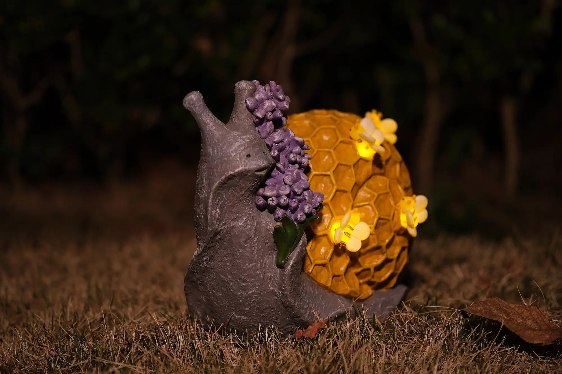 glowing bee LED lights on honeycomb shell snail garden statue