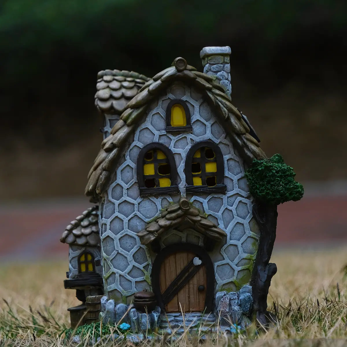 Solar stone fairy house in garden 