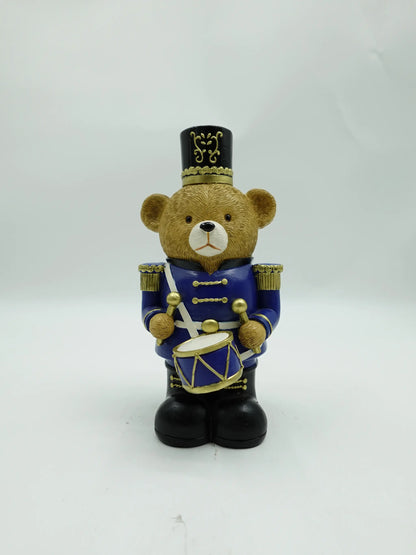 the Christmas teddy bear drummer figurine in blue uniform, front view