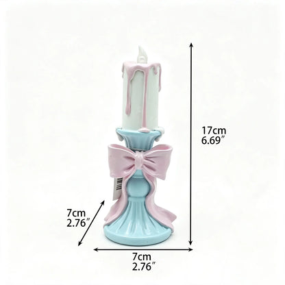 Hand-painted pastel candle holder with dimensions 17cm height, 7cm width, 7cm depth on white background