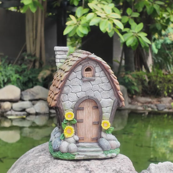 Video of Solar Sunflower Garden House Statue