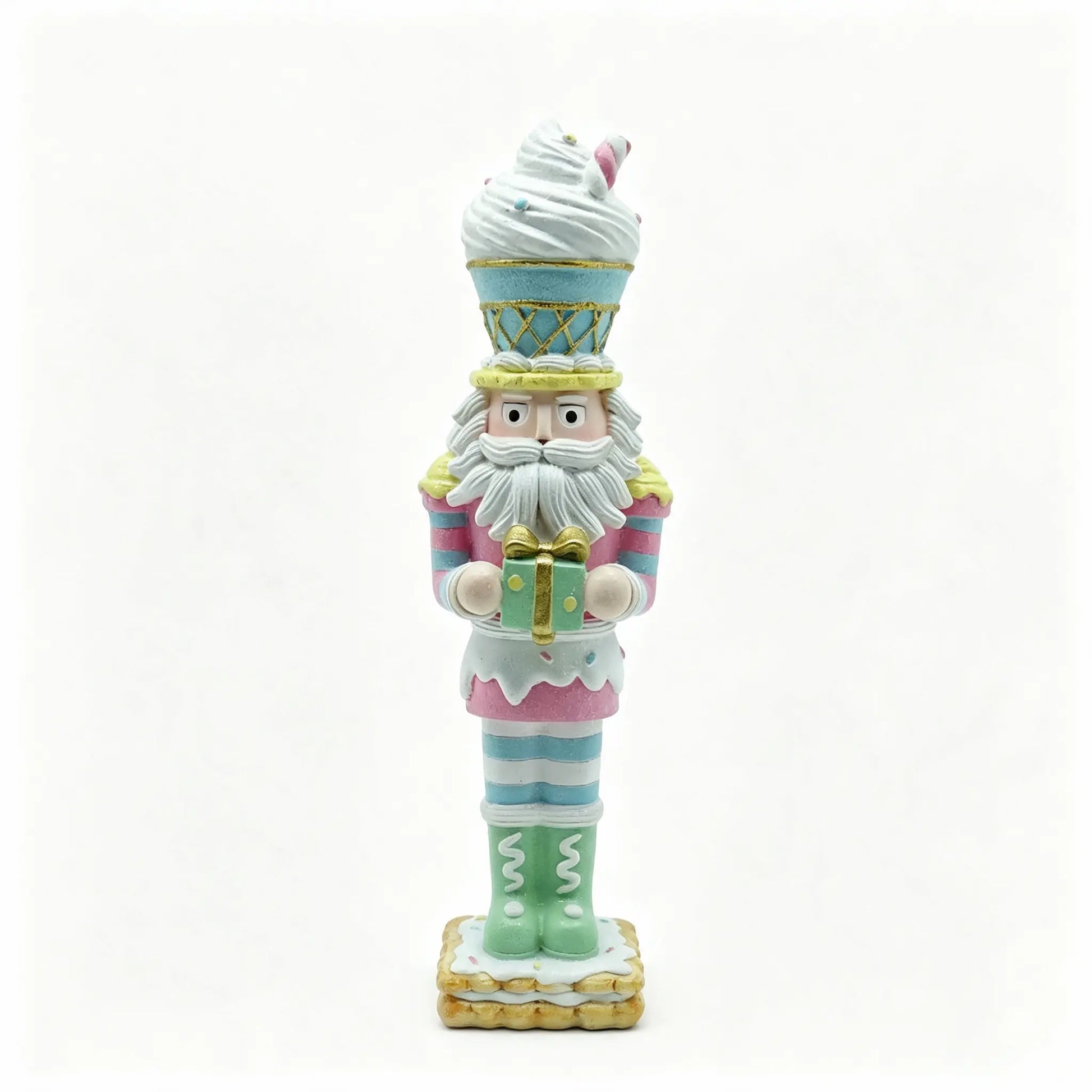 Hand-painted nutcracker figurine styled like a candy-themed character, holding a wrapped gift on a plain white background.